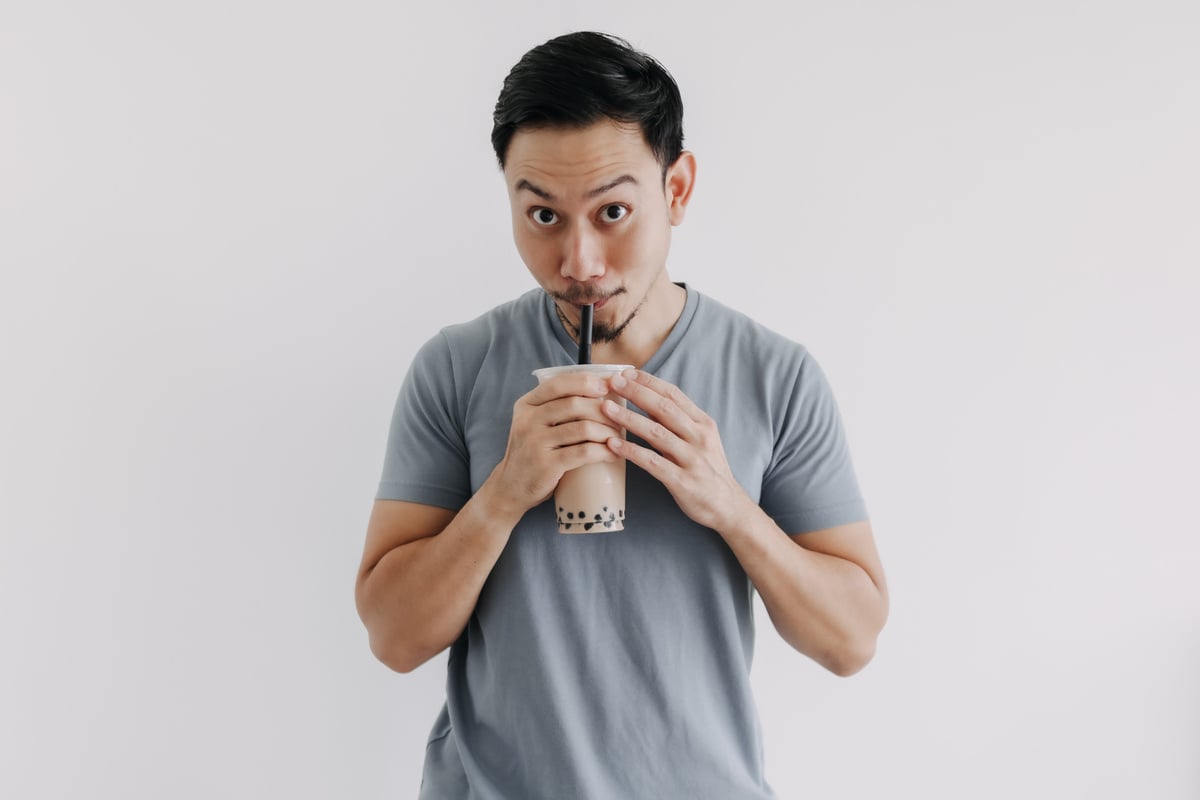 Man Drinking Boba Tea 